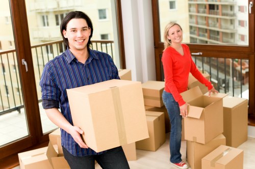 Professional movers loading furniture for an Eastcote relocation